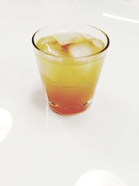 Close-up of drink against white background