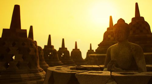 Statue of temple against sky