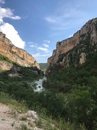 Scenic view of rocky mountains against sky