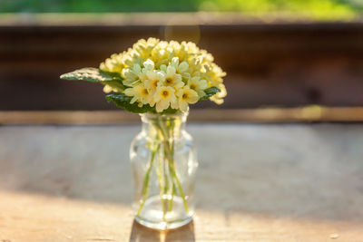 Close-up of flower vase on table