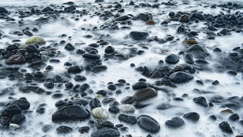 Full frame shot of rocks on beach