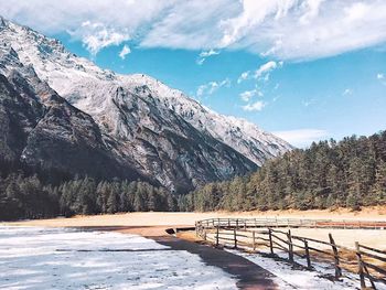 Scenic view of snowcapped mountain against sky