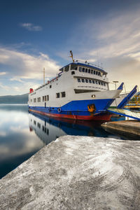 View of ship moored on sea against sky