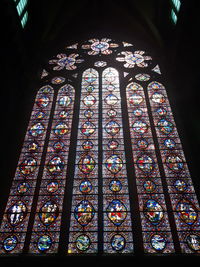 Low angle view of stained glass window of building