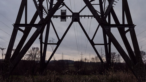 Low angle view of metal structure against sky