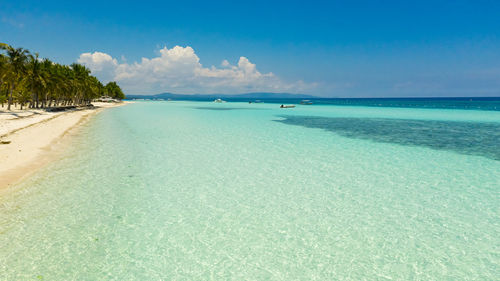 Beautiful tropical beach with white sand and turquoise ocean. panglao island, bohol, philippines.