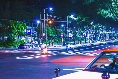 Illuminated street light at night