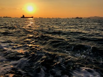 Scenic view of sea against sky during sunset