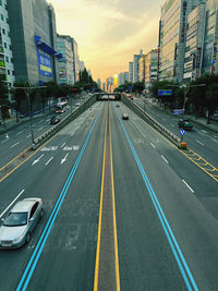 High angle view of light trails on road in city