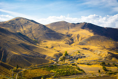 Scenic view of valley against sky