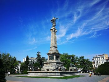 Statue of liberty against blue sky