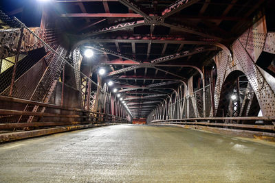 Underground vintage urban city steel bridge and empty road