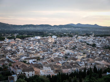 High angle view of cityscape against sky during sunset