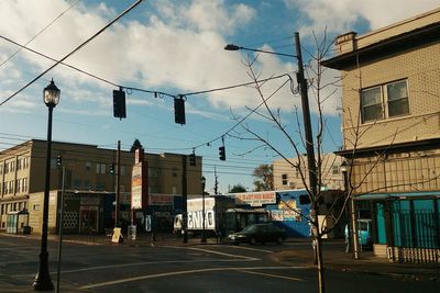 Buildings in city against sky