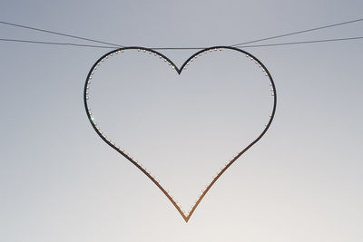 Close-up of heart shape against clear sky