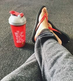 Low section of red shoes