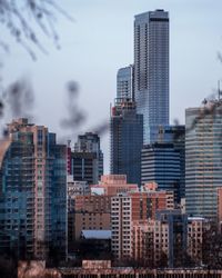 Buildings in city against sky