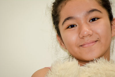 Close-up portrait of a smiling girl