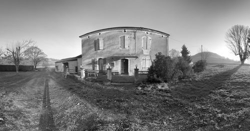 Abandoned building against clear sky