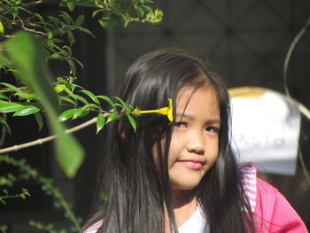 Close-up portrait of a girl looking down