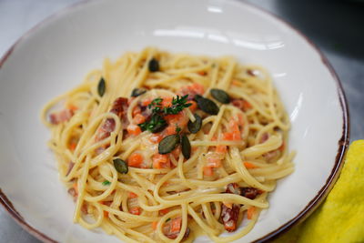 High angle view of noodles served in plate on table