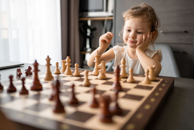 Boy playing chess