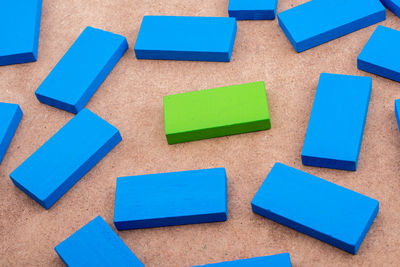 High angle view of blue paper on table