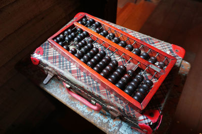Old wooden abacus on old briefcase