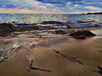 Scenic view of sea at sunset