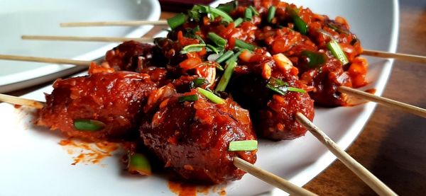 High angle view of meat served in plate on table