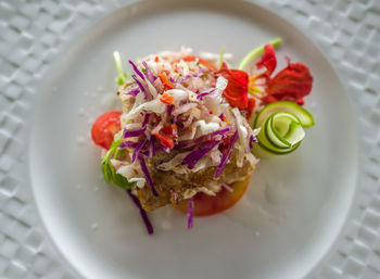 High angle view of salad in plate on table