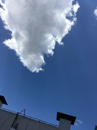 Low angle view of built structure against blue sky