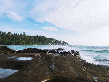 Scenic view of beach against sky