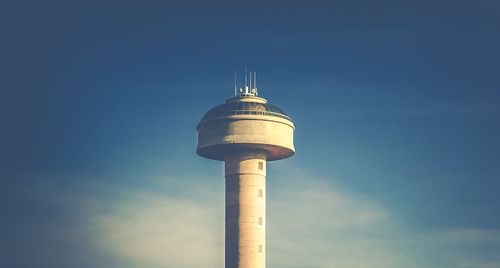 Low angle view of building against blue sky