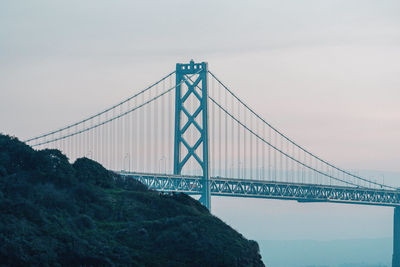 View of suspension bridge against sky