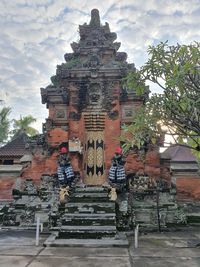 Exterior of temple building against sky