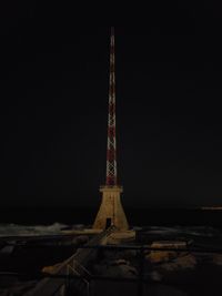 Tower of building against sky at night