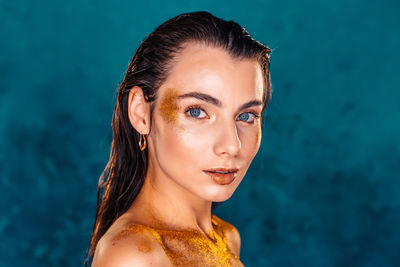 Portrait of young woman in swimming pool