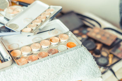 High angle view of make-up kits