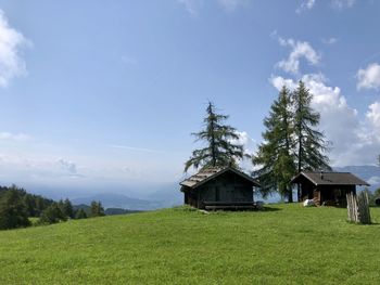 House on field against sky