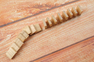 High angle view of toy blocks arranged on wooden table