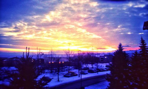 Scenic view of cloudy sky at sunset