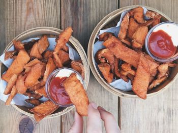 Close-up of potato fries and dips