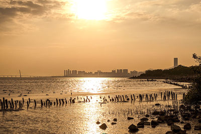 Scenic view of sea against sky during sunset