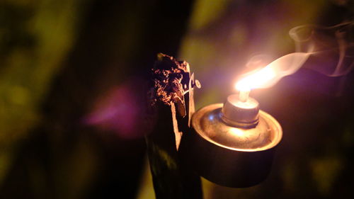 Close-up of burning candle