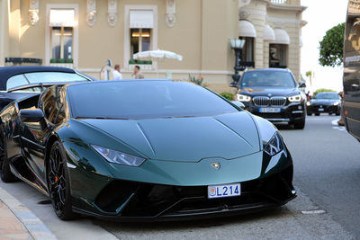 View of cars parked on road