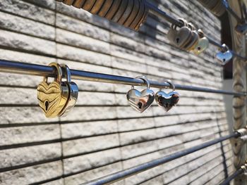 Low angle view of metal hanging on ceiling