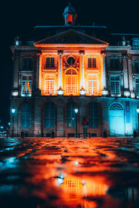 Illuminated building at night