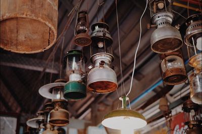 Low angle view of illuminated electric lamp