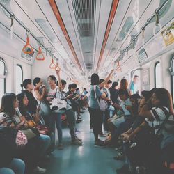 Group of people sitting in bus